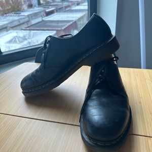 Classic Dr Martens black derby shoes with gold stitching!